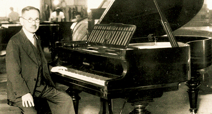 Koichi Kawai with the grand piano No. 500